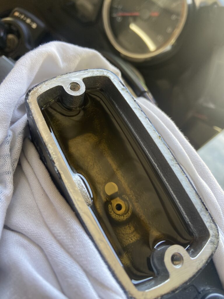 Photo of the master cylinder with the lid removed