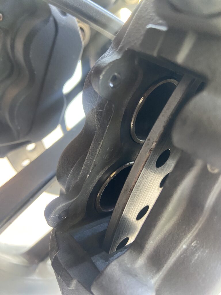 Photo of the caliper with the piston pushed back in